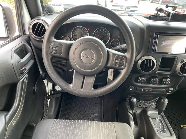 used 2012 Jeep Wrangler Unlimited car, priced at $16,973