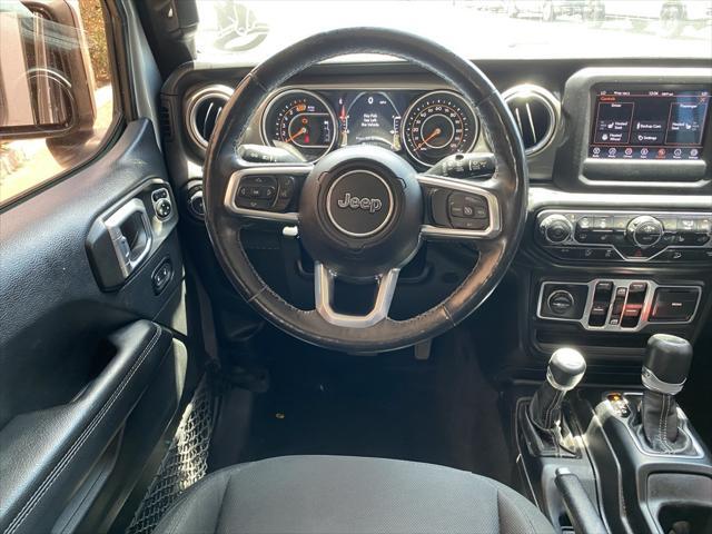 used 2018 Jeep Wrangler Unlimited car, priced at $23,573