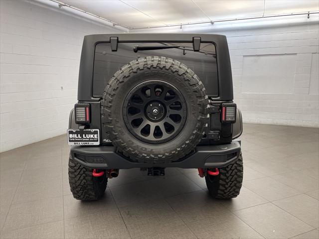 used 2016 Jeep Wrangler Unlimited car, priced at $22,573