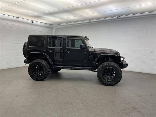 used 2016 Jeep Wrangler Unlimited car, priced at $22,573