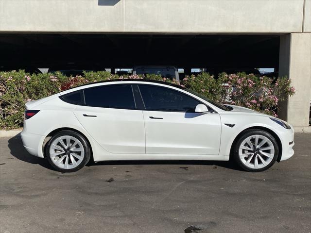 used 2022 Tesla Model 3 car, priced at $27,173