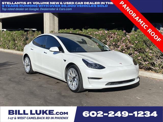 used 2022 Tesla Model 3 car, priced at $27,573