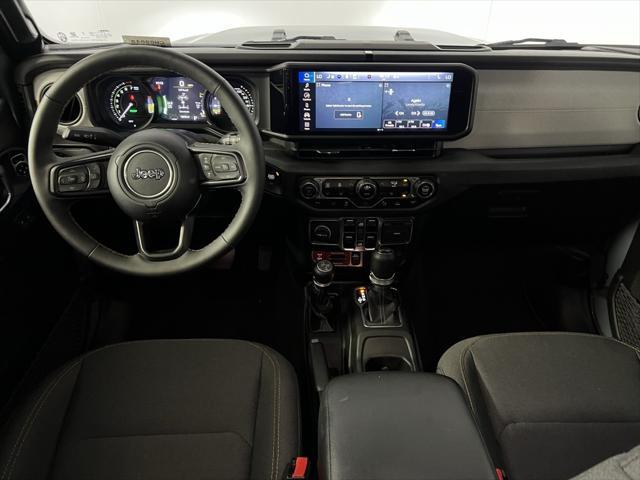 used 2024 Jeep Wrangler 4xe car, priced at $37,573