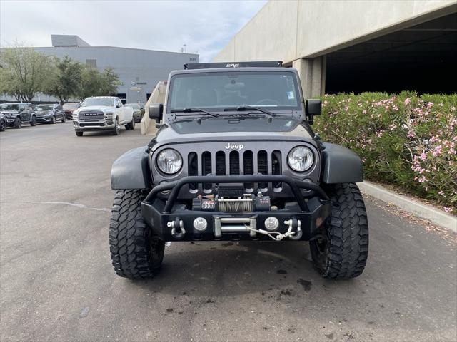 used 2016 Jeep Wrangler Unlimited car, priced at $19,573