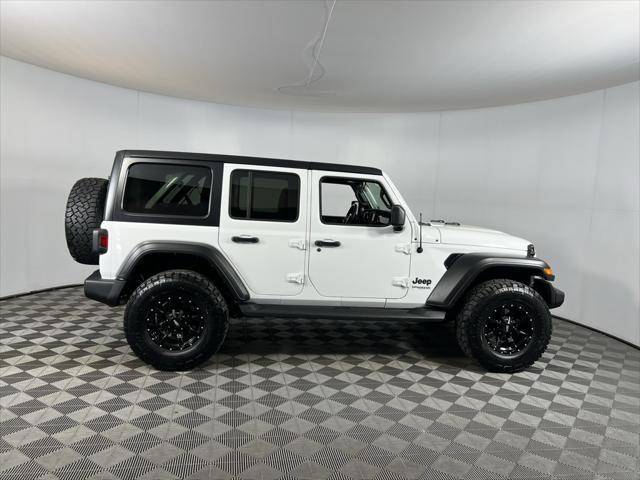 used 2021 Jeep Wrangler Unlimited car, priced at $33,273