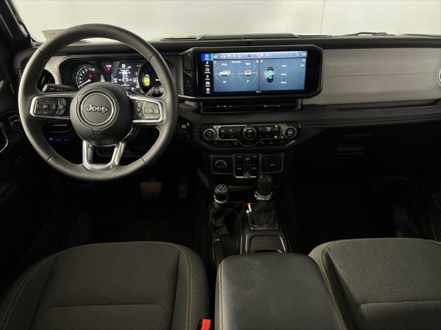 used 2024 Jeep Wrangler 4xe car, priced at $35,673