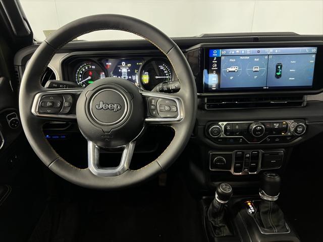 used 2024 Jeep Wrangler 4xe car, priced at $35,673
