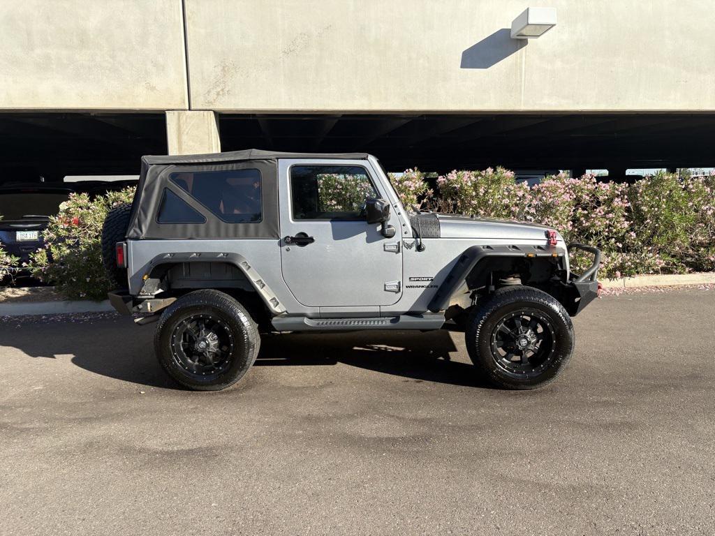 used 2014 Jeep Wrangler car, priced at $17,973