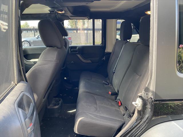 used 2016 Jeep Wrangler Unlimited car, priced at $20,973
