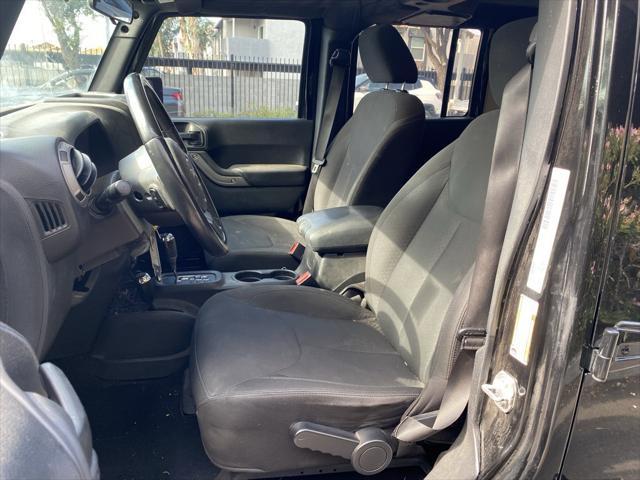 used 2016 Jeep Wrangler Unlimited car, priced at $20,973