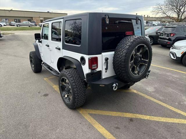 used 2012 Jeep Wrangler Unlimited car, priced at $15,995