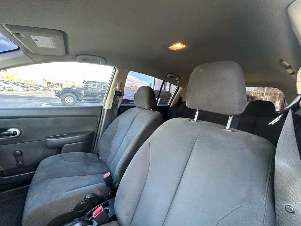 used 2009 Nissan Versa car, priced at $4,995