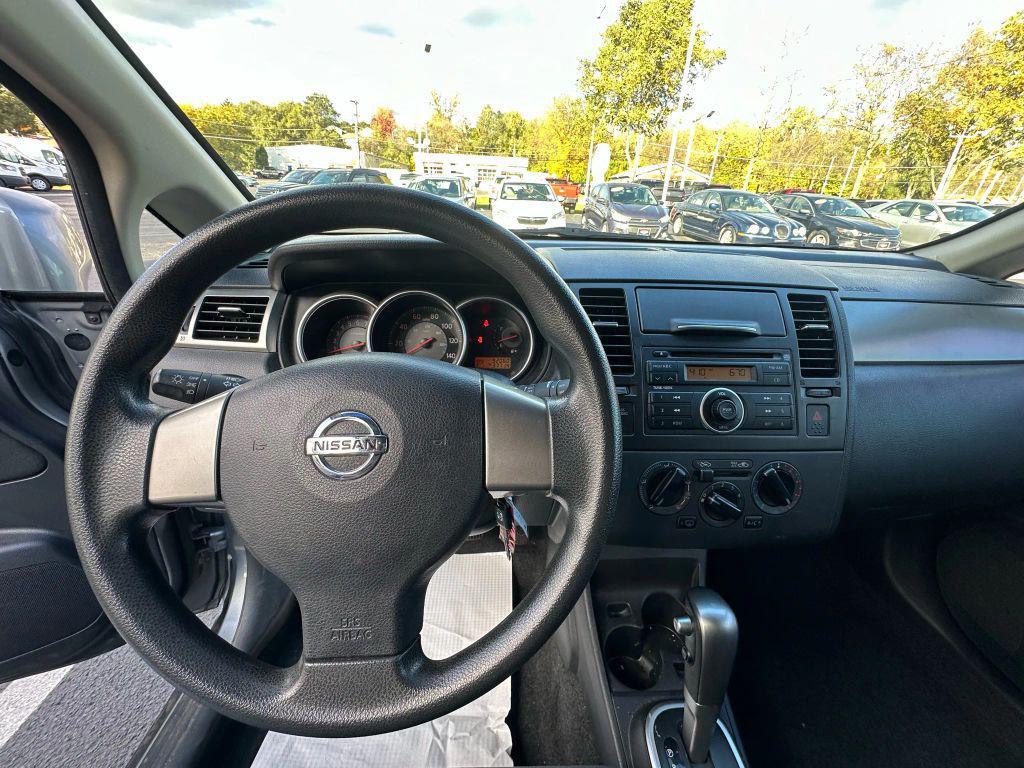 used 2009 Nissan Versa car, priced at $4,995