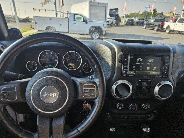 used 2013 Jeep Wrangler Unlimited car, priced at $21,463