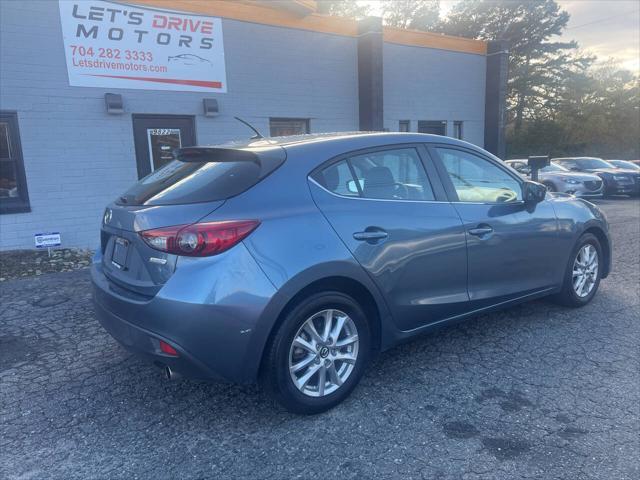 used 2014 Mazda Mazda3 car, priced at $5,990