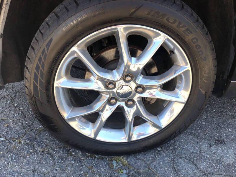 used 2014 Jeep Grand Cherokee car, priced at $10,998