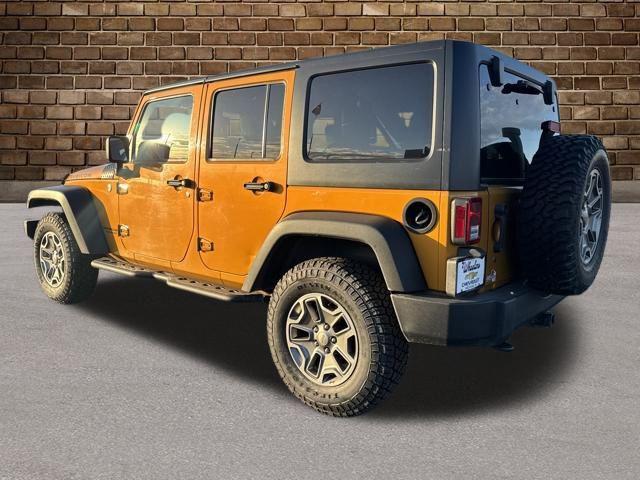 used 2014 Jeep Wrangler Unlimited car, priced at $15,478