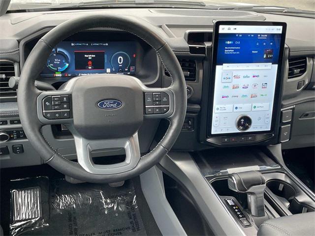 used 2024 Ford F-150 Lightning car, priced at $52,989