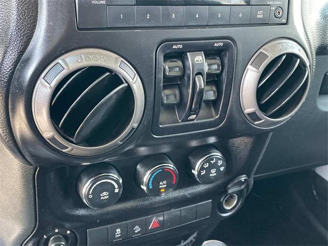 used 2015 Jeep Wrangler Unlimited car, priced at $15,000