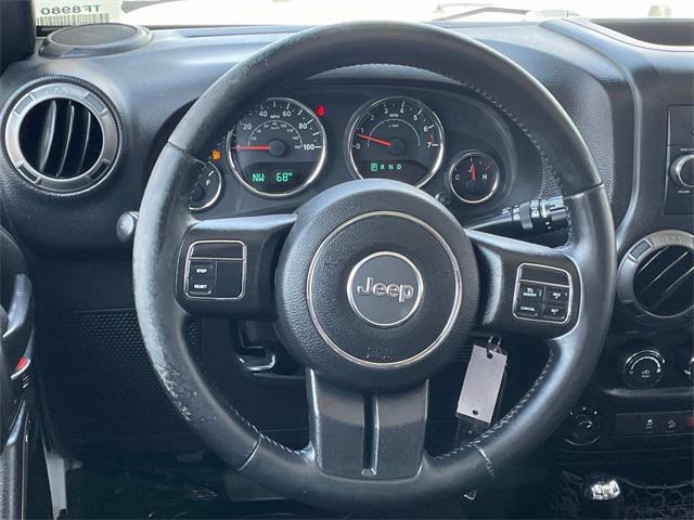 used 2015 Jeep Wrangler Unlimited car, priced at $15,000