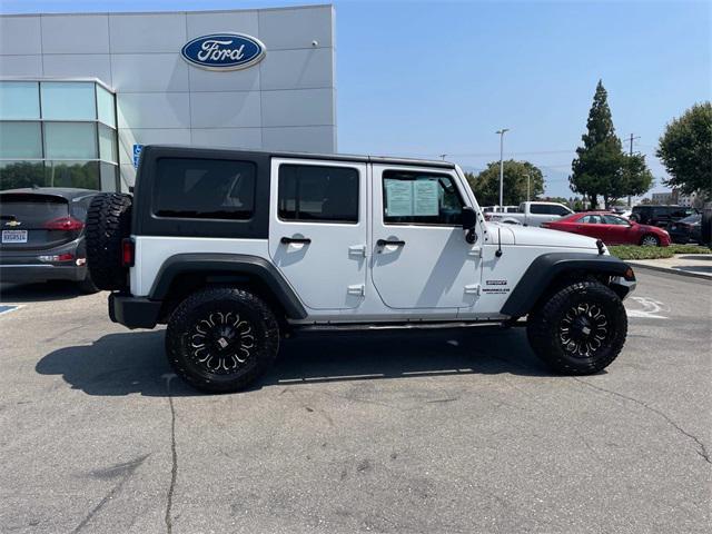 used 2015 Jeep Wrangler Unlimited car, priced at $15,000