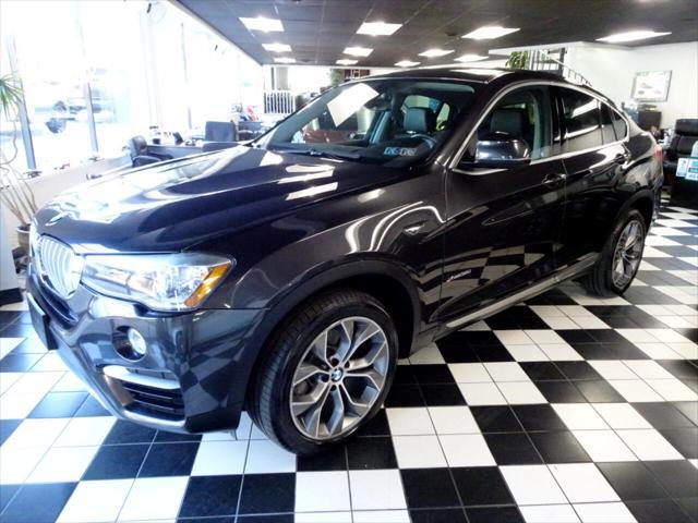 used 2016 BMW X4 car, priced at $23,988