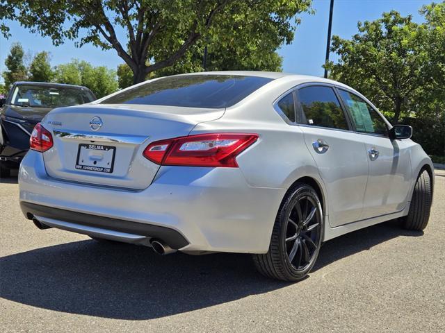 used 2017 Nissan Altima car, priced at $10,900