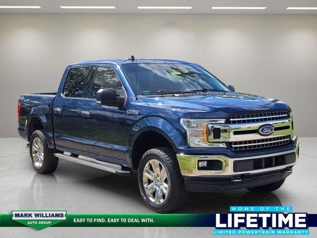 used 2018 Ford F-150 car, priced at $30,698