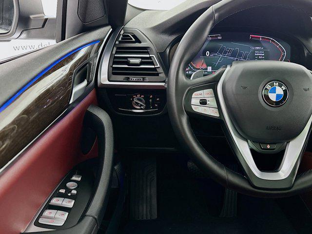 used 2023 BMW X4 car, priced at $43,839