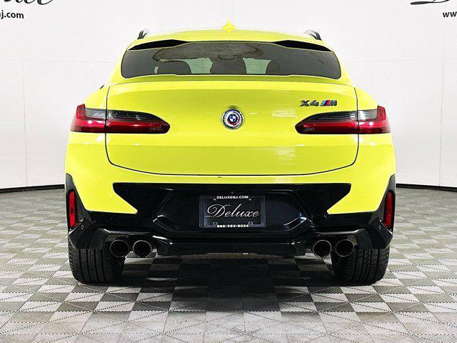 used 2022 BMW X4 M car, priced at $63,839