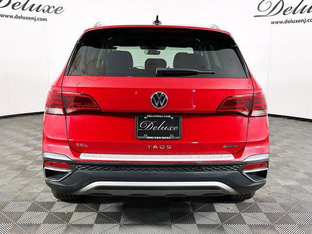 used 2023 Volkswagen Taos car, priced at $22,439