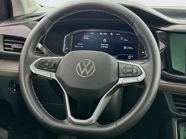 used 2023 Volkswagen Taos car, priced at $22,439