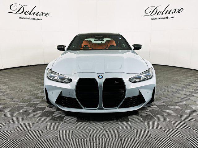 used 2022 BMW M4 car, priced at $72,839