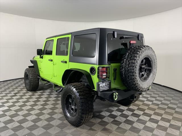 used 2013 Jeep Wrangler Unlimited car, priced at $16,488