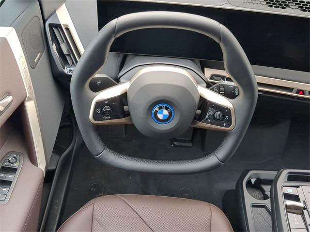 new 2025 BMW iX car, priced at $94,255