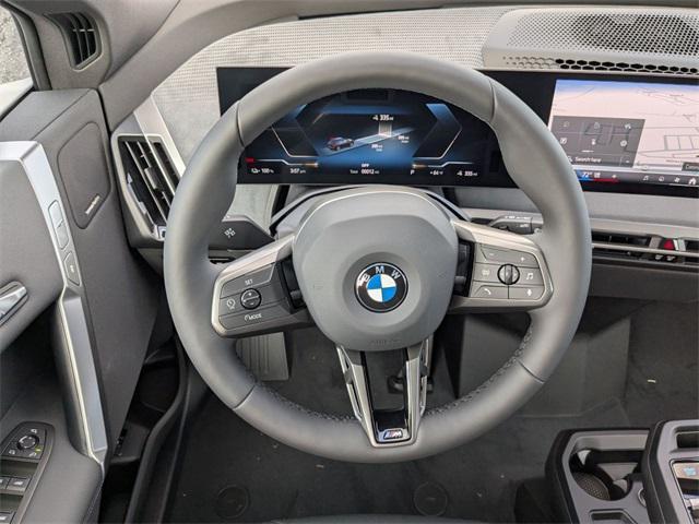 new 2026 BMW iX car, priced at $101,050