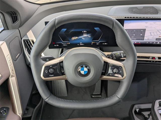 new 2026 BMW iX car, priced at $92,545
