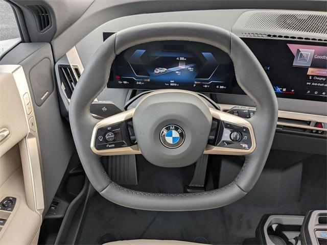 new 2026 BMW iX car, priced at $87,500