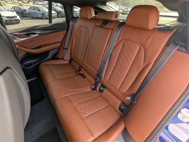 new 2025 BMW X4 M car, priced at $94,615