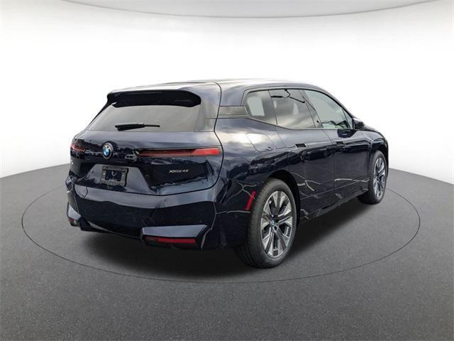 new 2026 BMW iX car, priced at $90,450