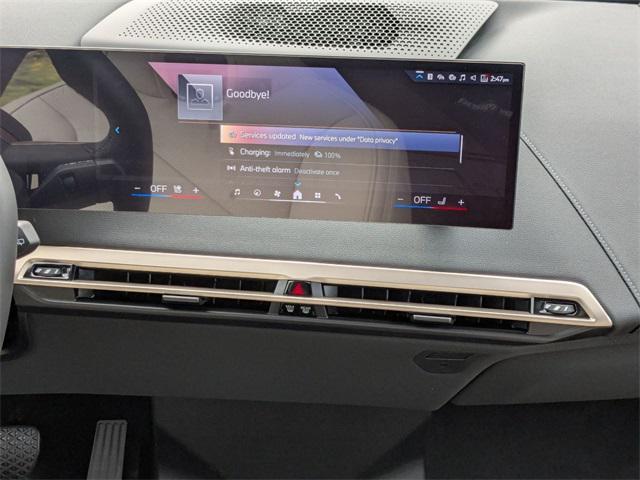 new 2026 BMW iX car, priced at $90,450