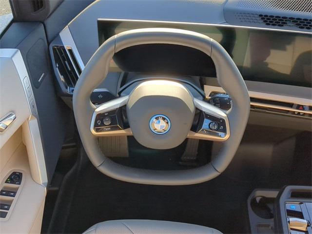 new 2025 BMW iX car, priced at $94,255