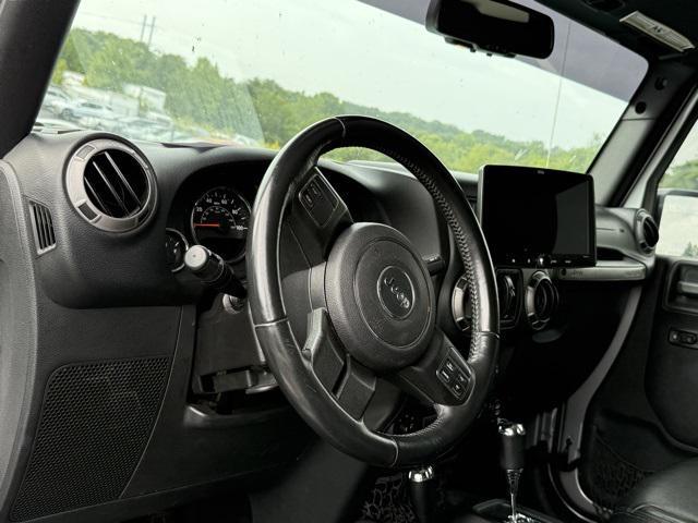 used 2016 Jeep Wrangler Unlimited car, priced at $18,510