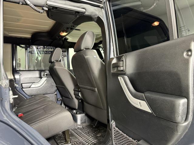 used 2016 Jeep Wrangler Unlimited car, priced at $24,271