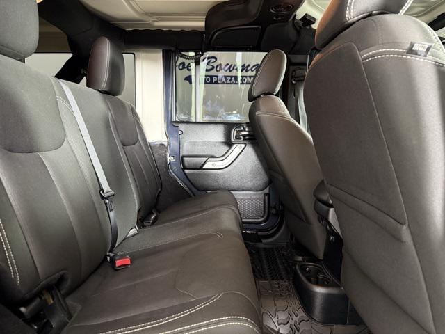 used 2016 Jeep Wrangler Unlimited car, priced at $24,271