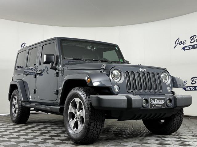 used 2016 Jeep Wrangler Unlimited car, priced at $24,271