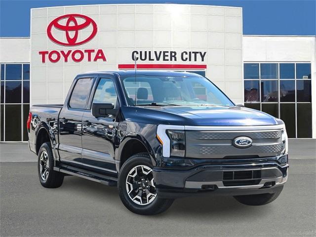 used 2022 Ford F-150 Lightning car, priced at $47,555