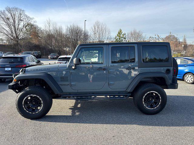 used 2014 Jeep Wrangler Unlimited car, priced at $17,988