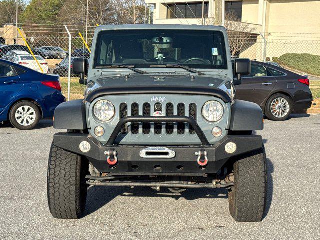 used 2014 Jeep Wrangler Unlimited car, priced at $17,988