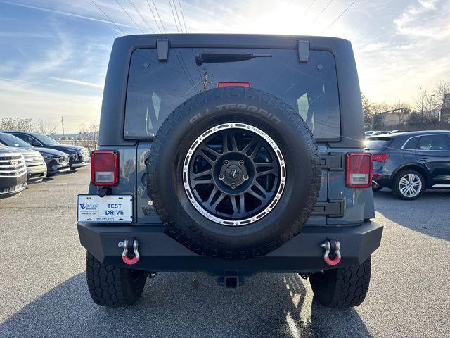 used 2014 Jeep Wrangler Unlimited car, priced at $17,988